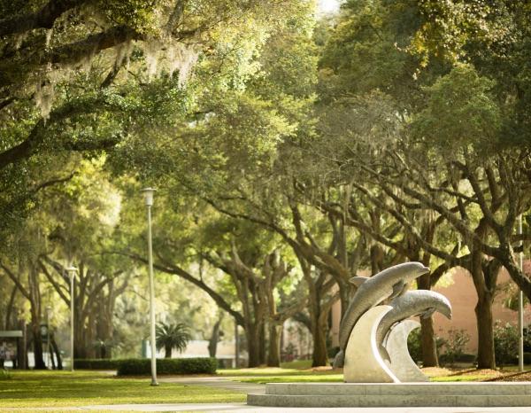 The dolphin statues behind Howard Administration Building.