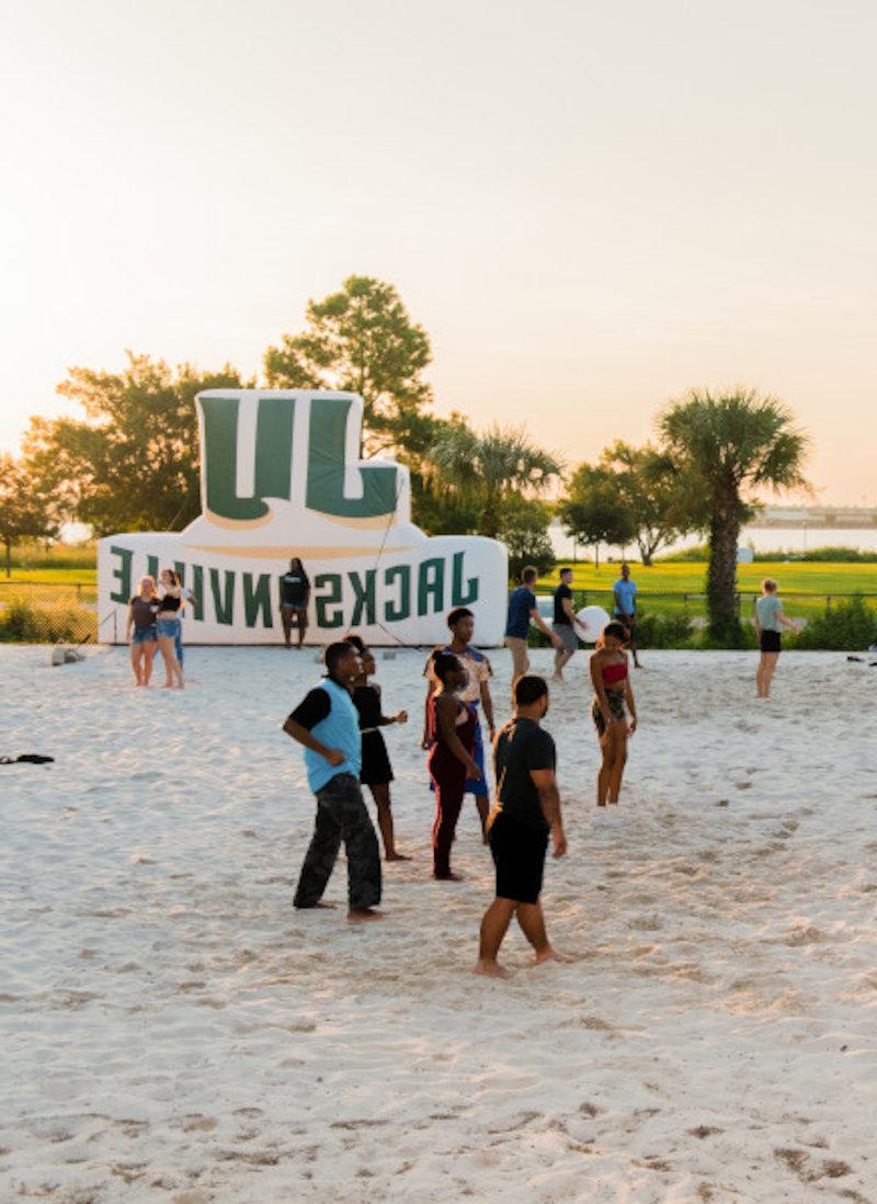 JU Students playing sand volleyball